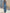 Ruffled V-Neck Belted Denim Jumpsuit