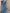Ruffled V-Neck Belted Denim Jumpsuit