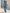 Ruffled V-Neck Belted Denim Jumpsuit