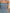 Smocked Ruffle Tiered Denim Jumpsuit