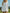 Fashionable And Casual Half-zip White Long-sleeved Pleated Hooded Mini Dress